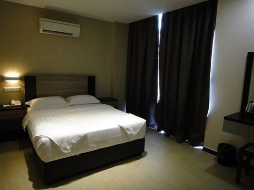 Galaxy Hotel Simpang Ampat  Номер фото