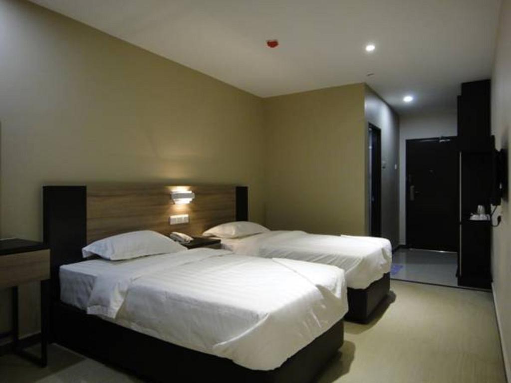 Galaxy Hotel Simpang Ampat  Номер фото